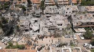 ‘It’s heavy on the heart’: Israelis survey damage in city hit by Iranian missile